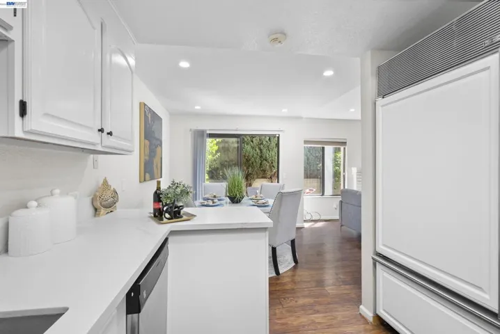 Open kitchen flowing into dining area