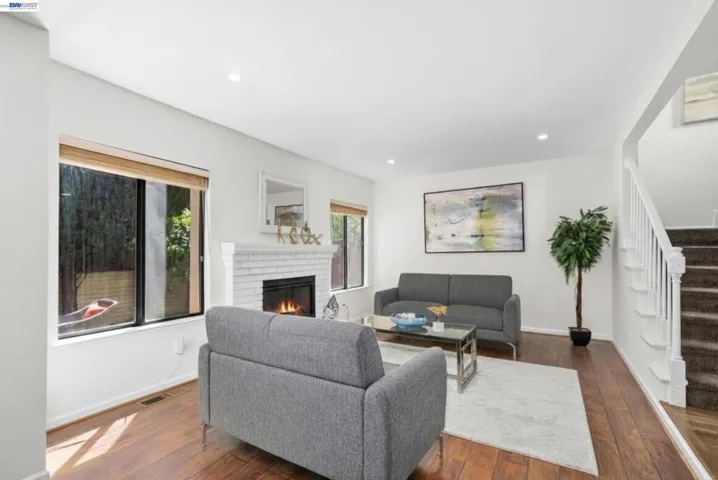 Spacious living room with laminate flooring