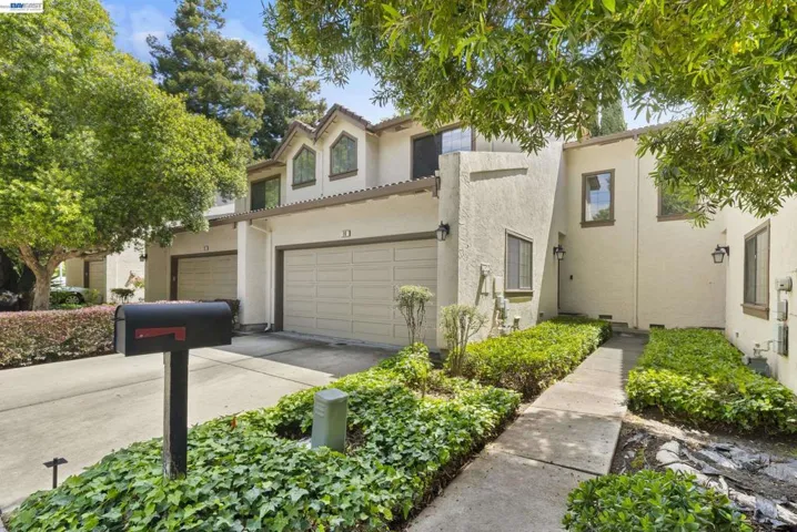 Landscaped entry with inviting walkway and curb appeal