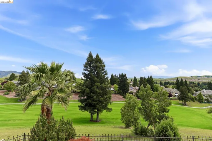 View of property's community featuring a mountain view and golf course view