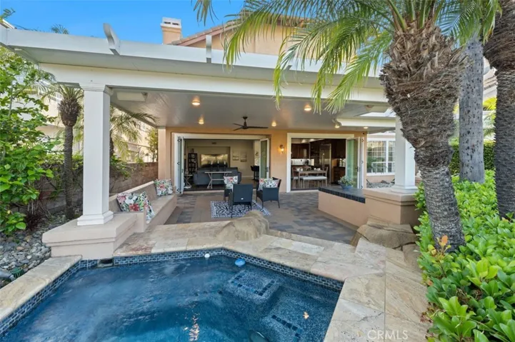 Folding glass doors in the family room and kitchen nook area, making an open space to beautiful backyard!
