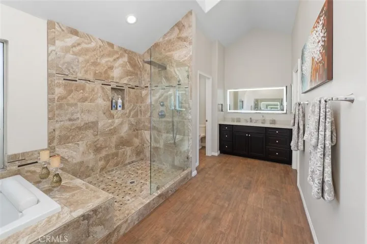 Large walk-in shower in primary bathroom