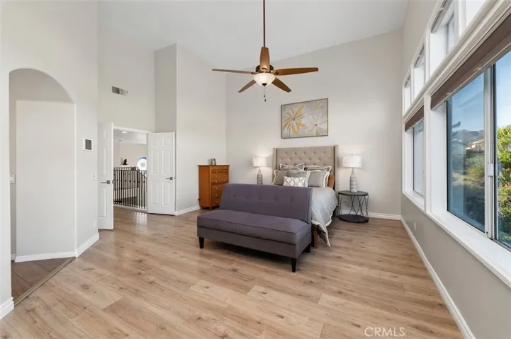 Primary bedroom with Stunning VIEWS with so many windows