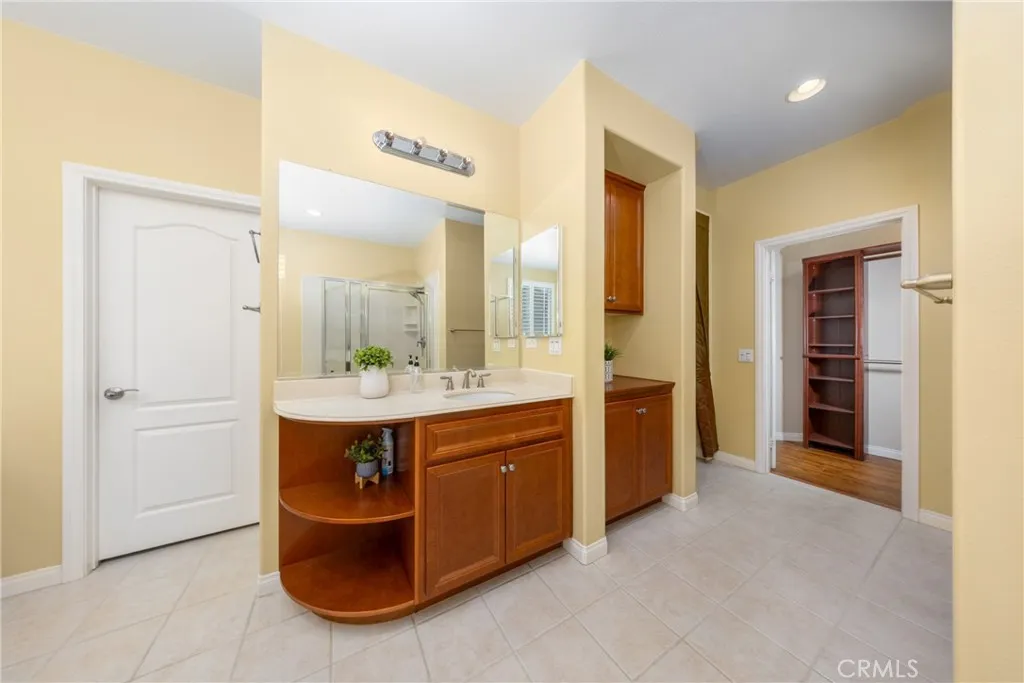 separate vanities in the master bedroom