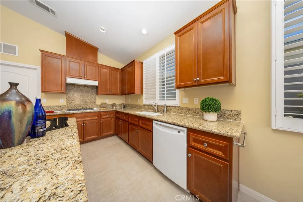 kitchen with window oversee the backyard.