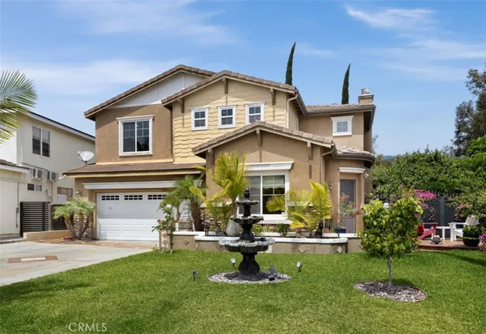 Welcome to this stunning Anaheim Hills home built in 2004 by D.R. Horton, ideally situated on an expansive 9,000 sq ft lot near the Anaheim Hills Golf Course and bordering Yorba Linda.