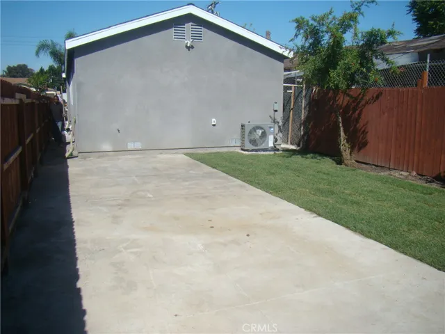 Rear driveway and yard space