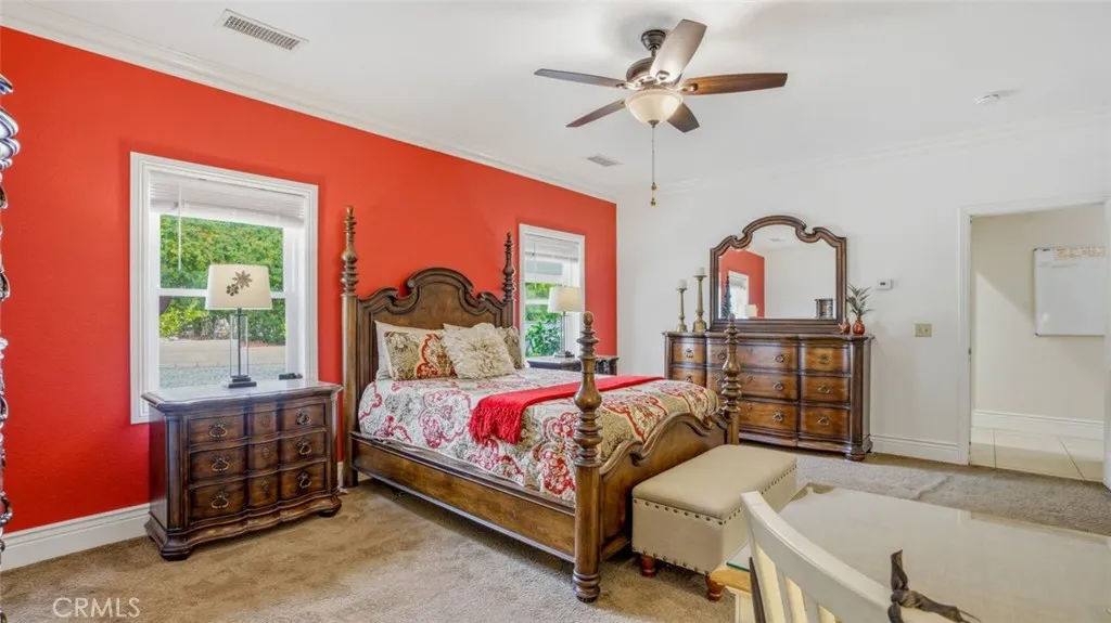 Primary Bedroom With Door Going Into Backyard