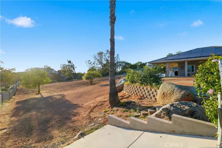 Backyard Entry Driveway to Lower Level of Flat Land