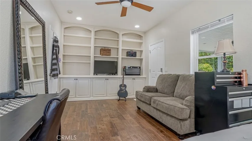 Den/ Bedroom with built-in cabinets