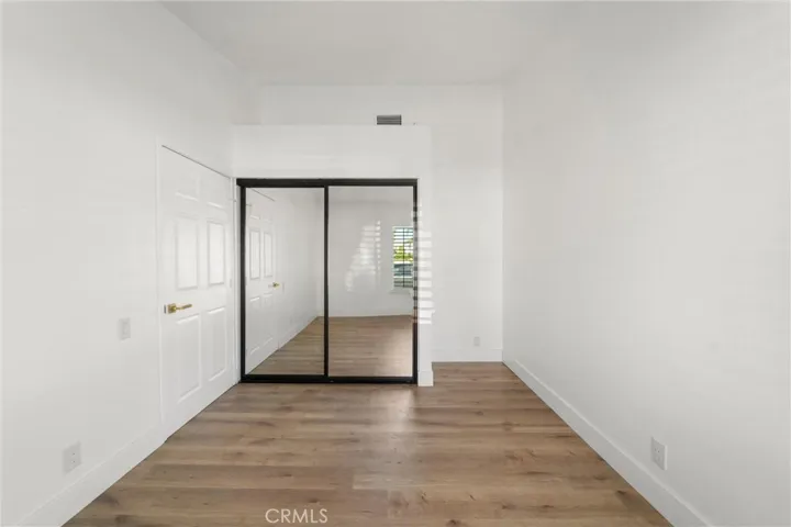 Bedroom One Mirrored closet doors.