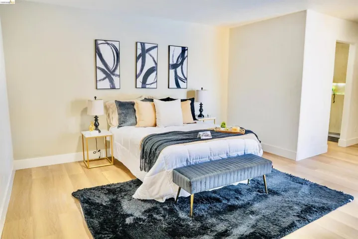 Bedroom with light wood-style floors