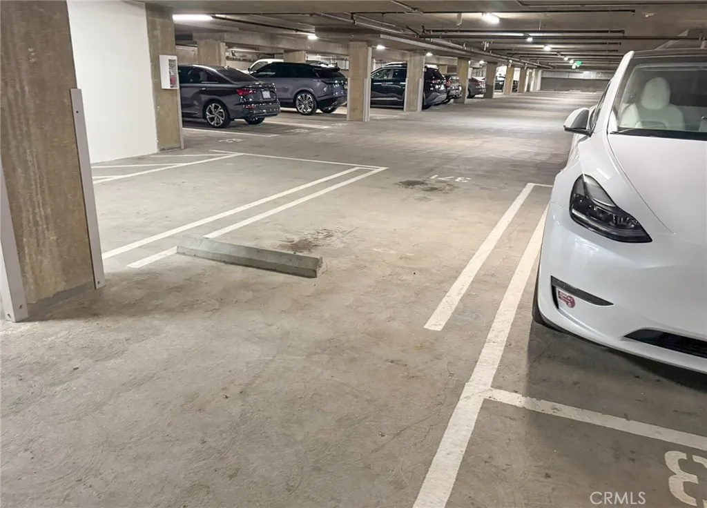 Parking Space #371, next to elevator. Rare spot with no parking on one side, and no tandem parking (P2)