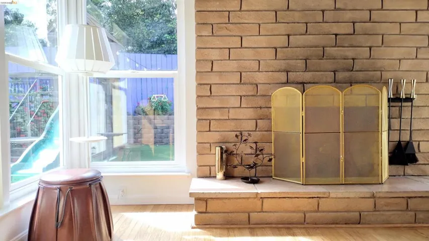 Detailed view of wood finished floors and baseboards