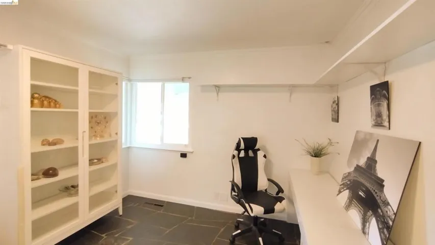 Home office featuring baseboards