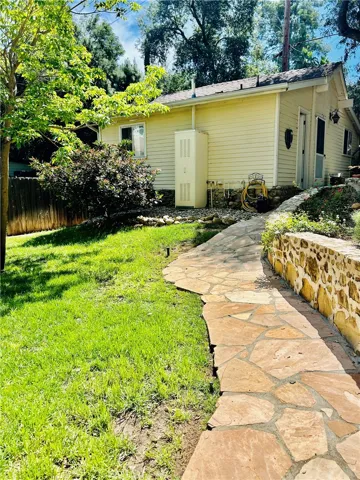 A pathway to the additional unit and laundry room