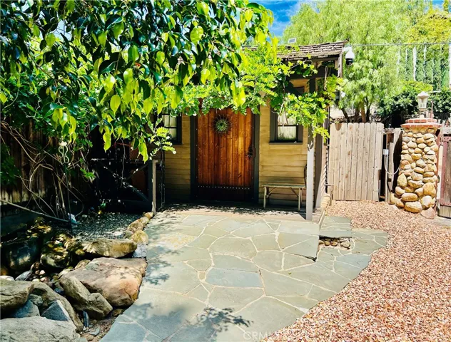 Custom shed located near front gate entrance
