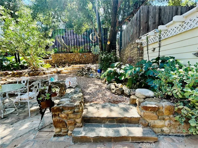 pathway to Ida Pl. with additional entry way and parking