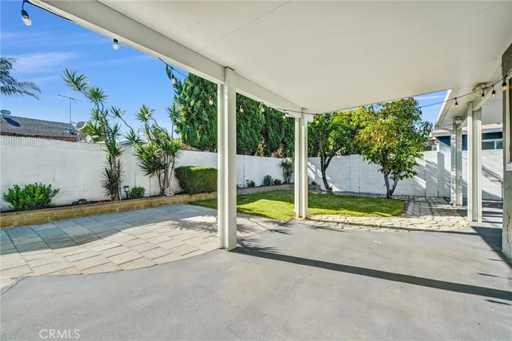 huge covered patio in back yard