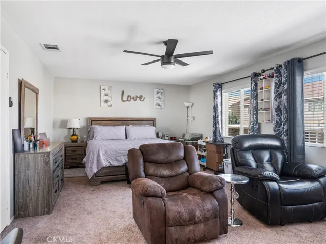Primary bedroom and sitting area