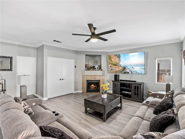 Family room with simulated fire in fireplace