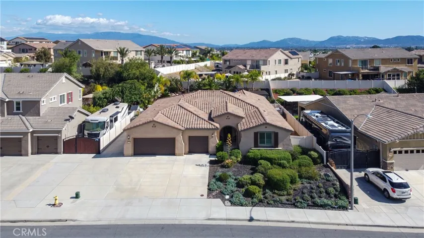 Drone photo of the home and the surrounding community