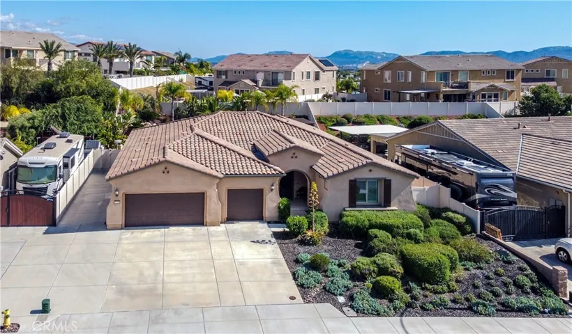 Drone photo of the home and the surrounding community