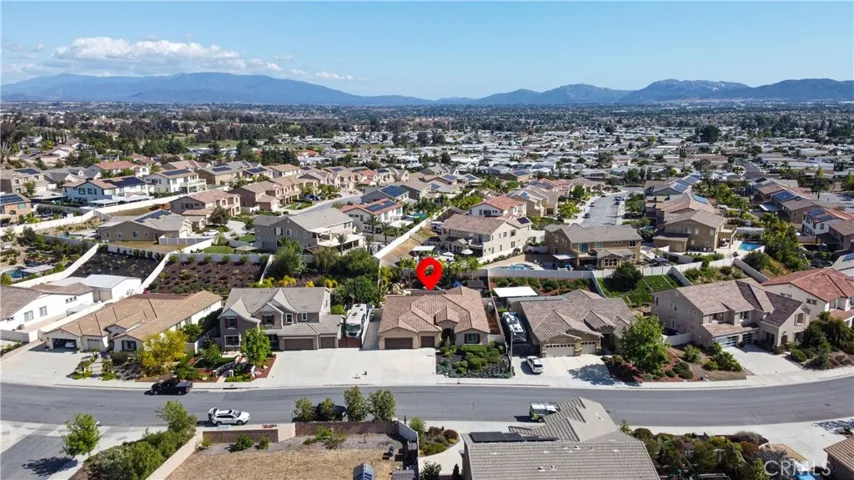 Drone photo of the home and the surrounding community