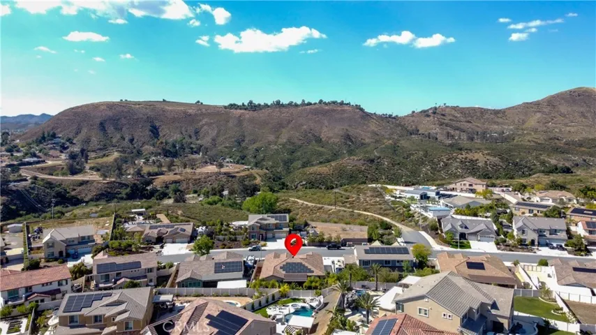 Drone photo of the home and the surrounding community