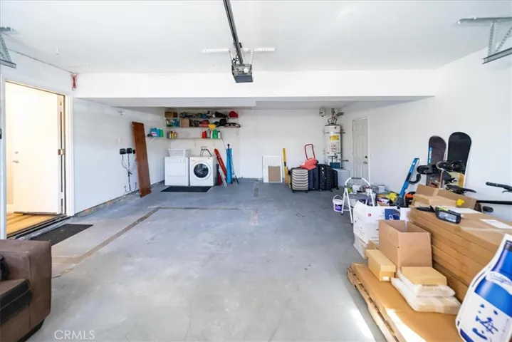 2 CAR GARAGE WITH LAUNDRY AND STORAGE AREA