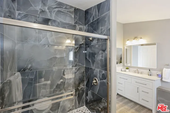 Huge Walk in Shower. His & Her