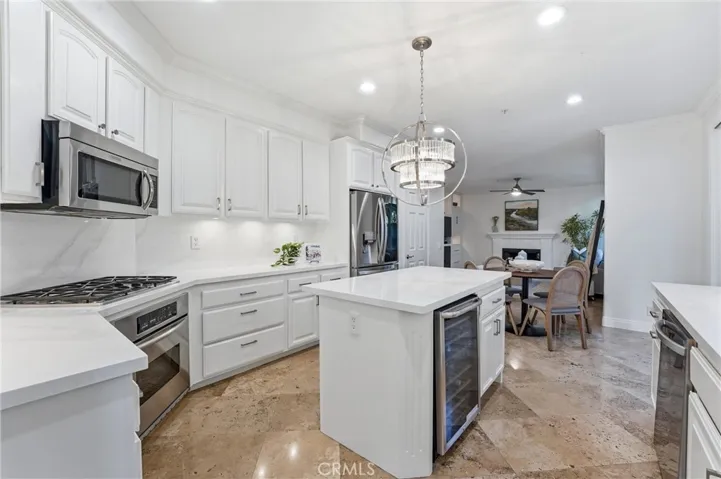 Stainless appliances, wine fridge and a walk in pantry