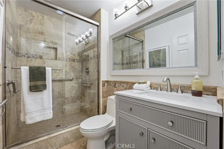 Main floor bath with shower with updated vanity and fixtures