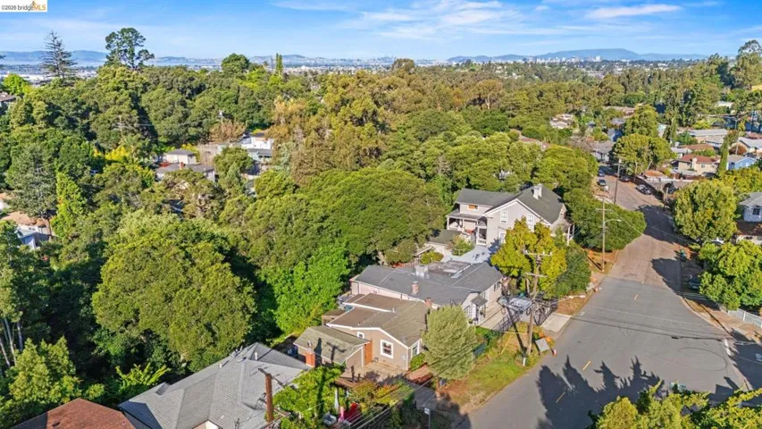 Aerial perspective of suburban area featuring mountains