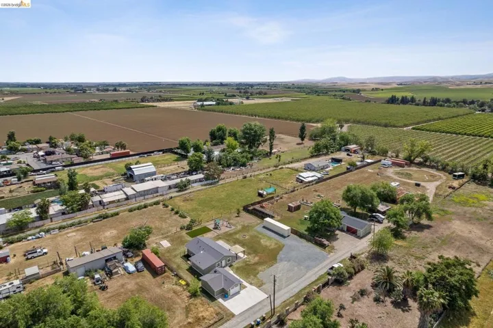 View of rural area featuring abundant farmland and mountains