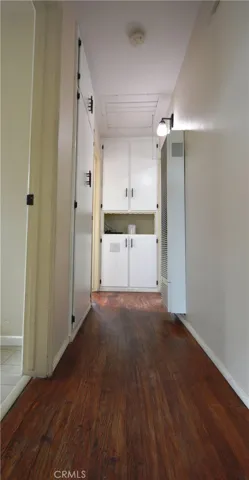 Another view of the hallway with its beautiful wood floors.