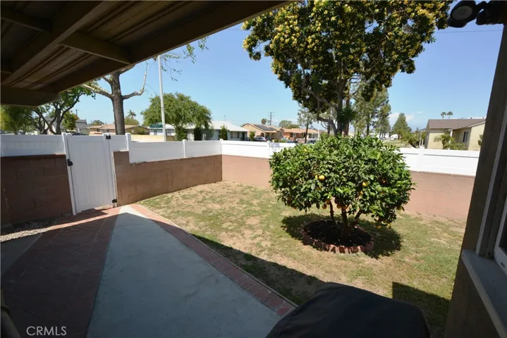 You can see the newly installed privacy fence and new gate to the driveway.