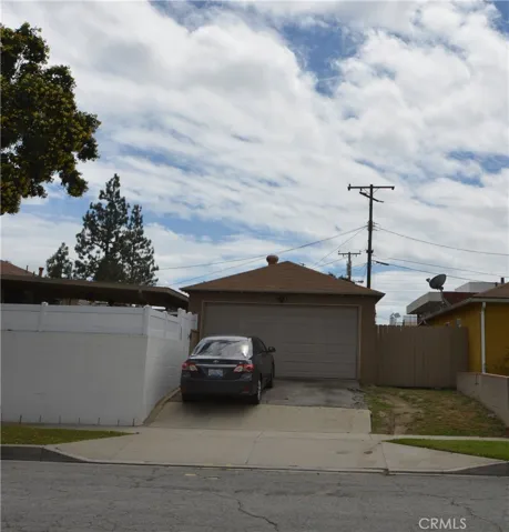 Here is the driveway and 2 car garage!