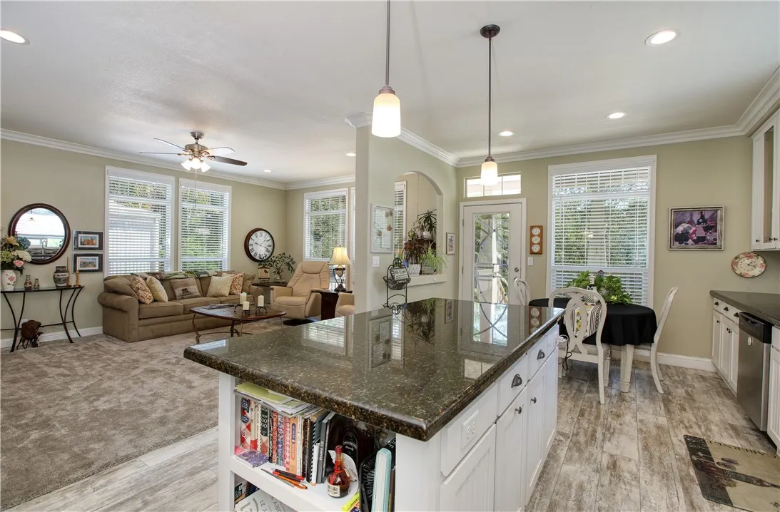 Open floor plan with large kitchen and granite counters