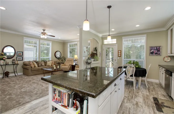 Open floor plan with large kitchen and granite counters