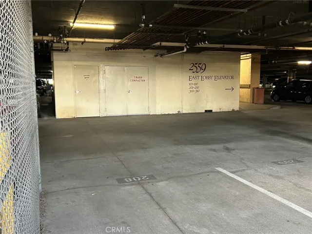 Parking 208 and 209 (side-by-side in front of elevators to building 2559)
