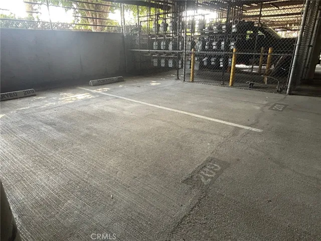 Parking 208 & 209 next to cage with meters