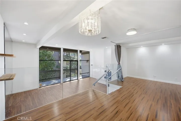 View of step-down living room from dining area!