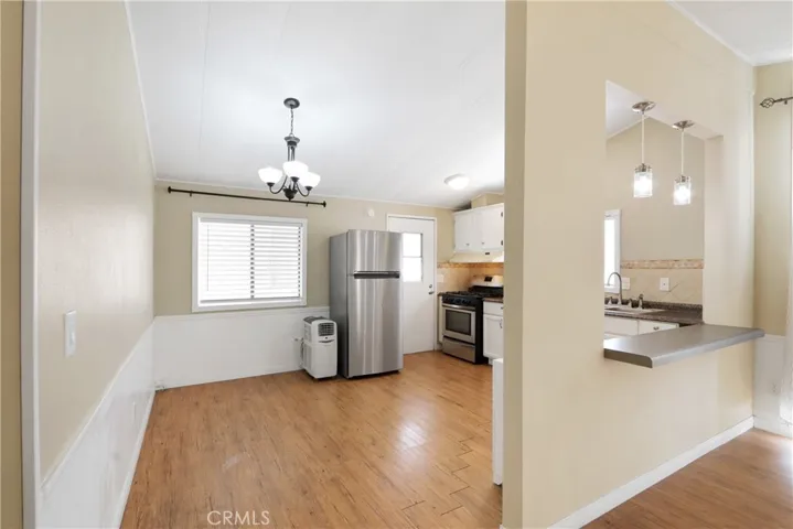 Alot of Natural Light with Nice Wood Flooring