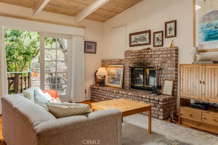 Living area of Guest Cottage with wood burning fireplace
