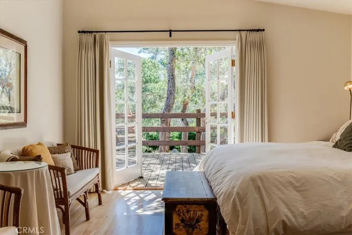 Primary Bedroom with French doors out to back deck