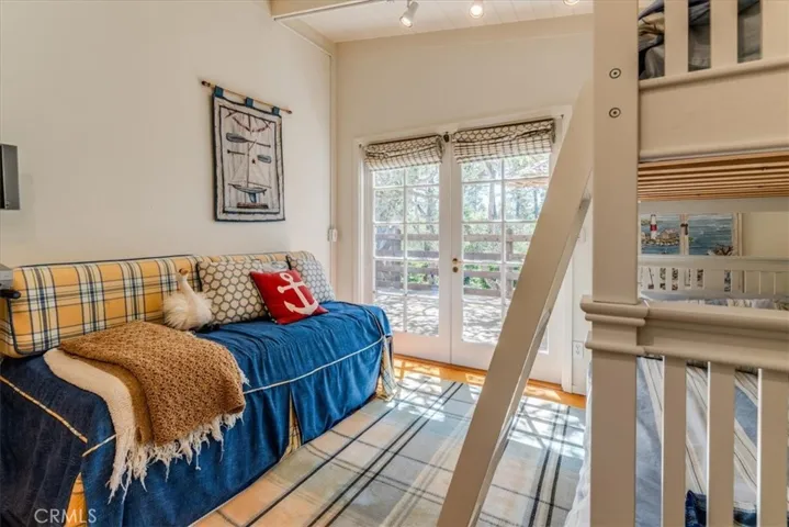 French Doors off Guest Bedroom out to back deck