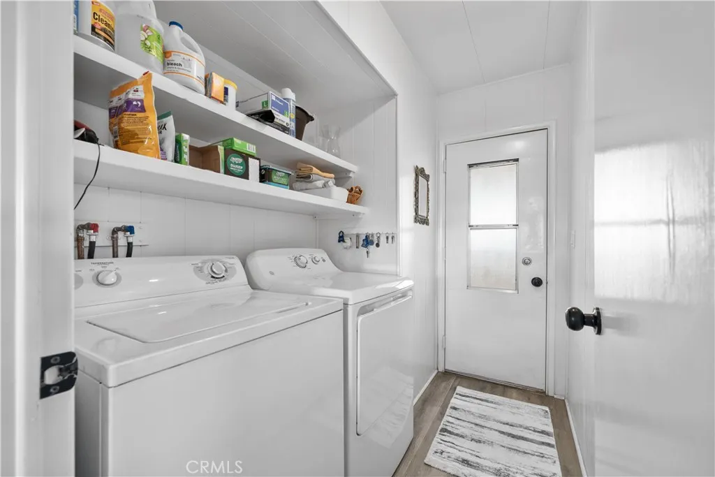 Laundry Room with door to carport area