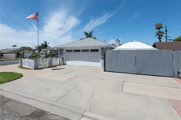 View to 2 car garage and large driveway