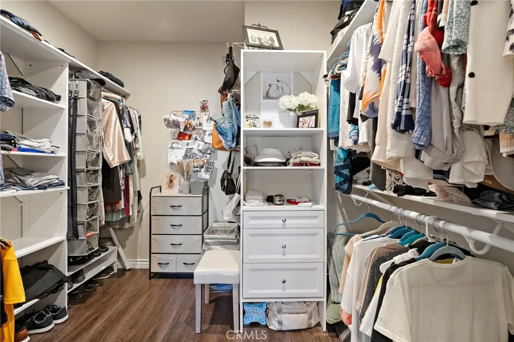 A very LARGE and VERY CUSTOM closet in the Primary Suite